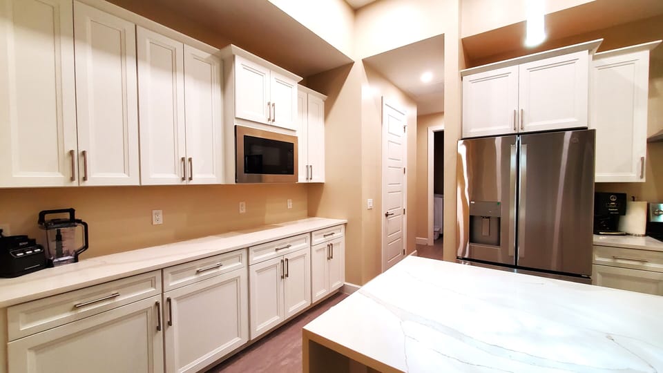 Spacious Modern Kitchen with Ample Cabinets and Counter Space
