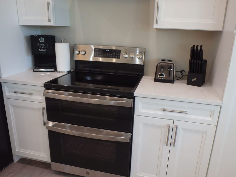 Fully Stocked Kitchen with Modern Appliances and Double Oven