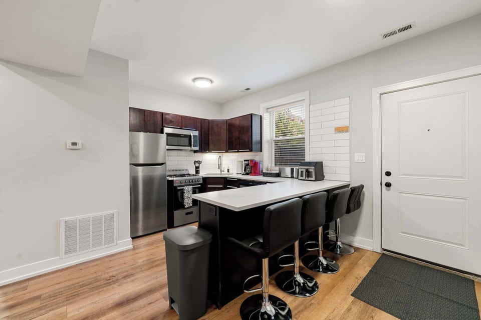 Open kitchen & dining flow ideal for shared meals.