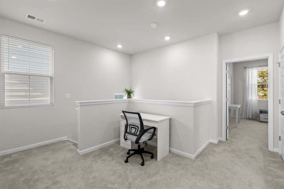 Loft workspace offering a calm spot for catching up on work or organizing your day