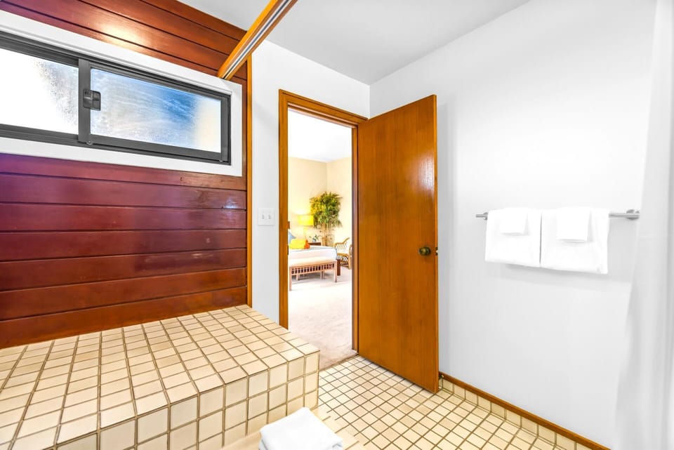 Bright and clean, the guest bath offers everything you need for a comfortable stay.