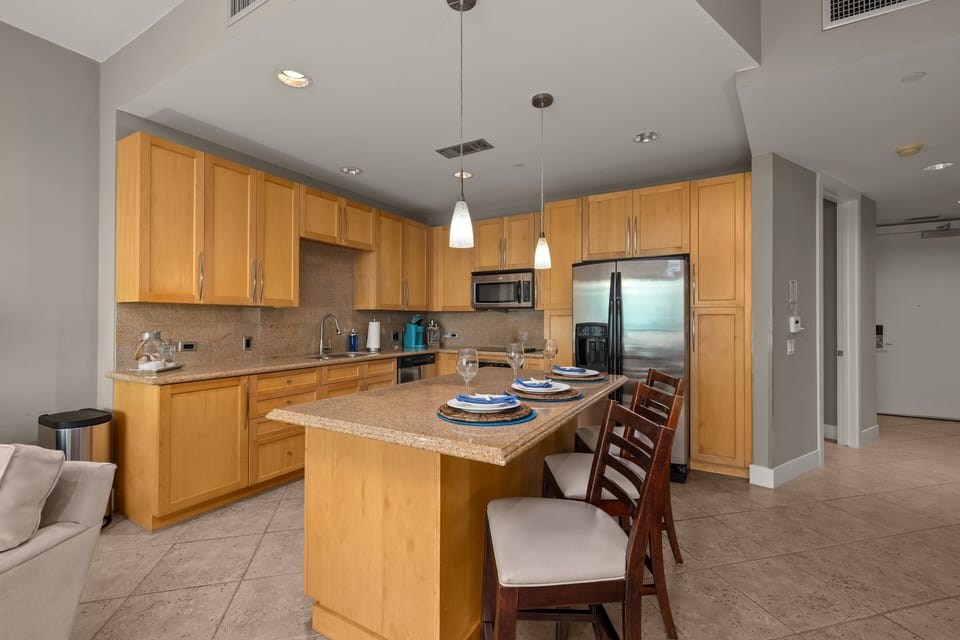 Open kitchen and dining area ideal for gatherings and meal prep