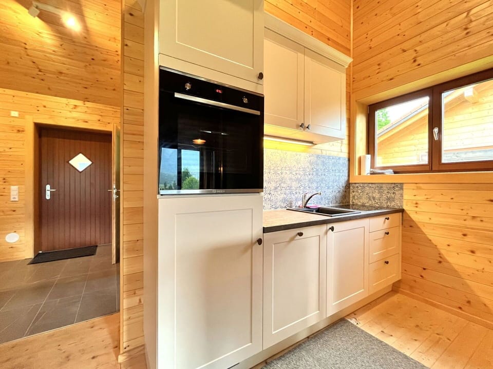 Wood, Flooring, Interior Design, Floor, Home, Cabinetry, Ceiling, Room, Wood Stain, Hardwood