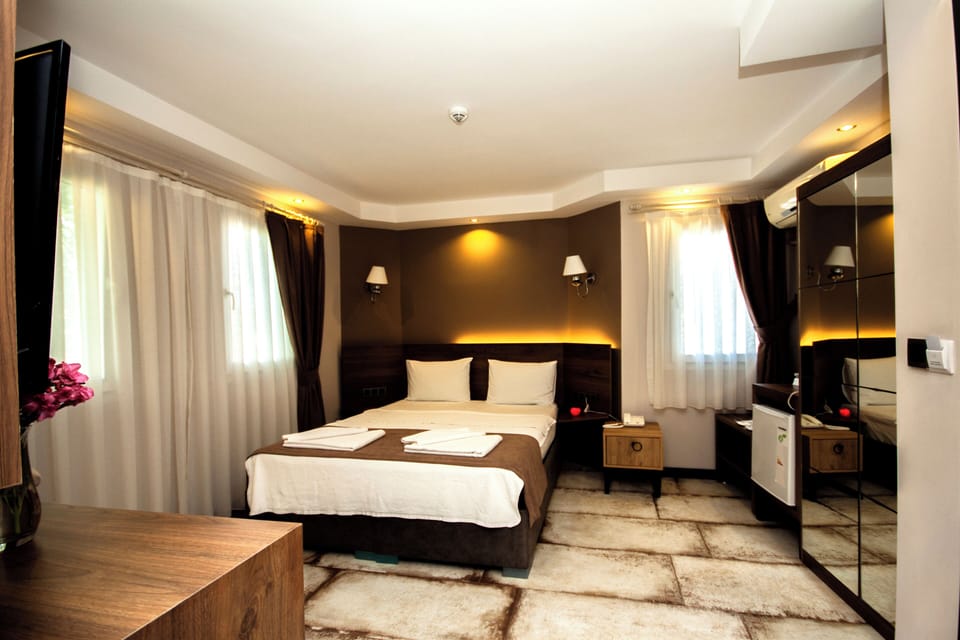 Classic Double Room, Garden View | In-room safe, blackout drapes, iron/ironing board, free WiFi