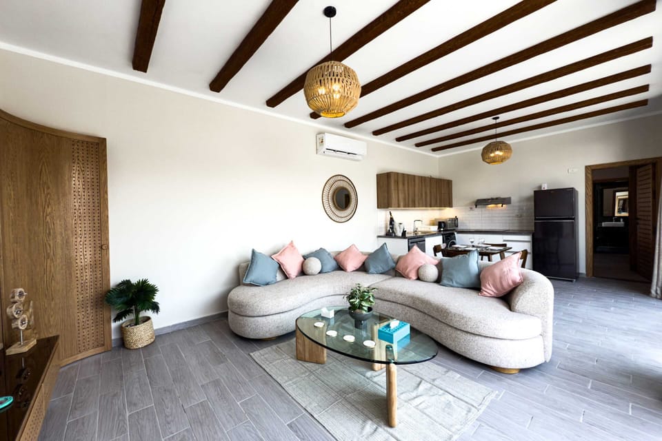 Basic Villa | Living area | 55-inch TV with cable channels