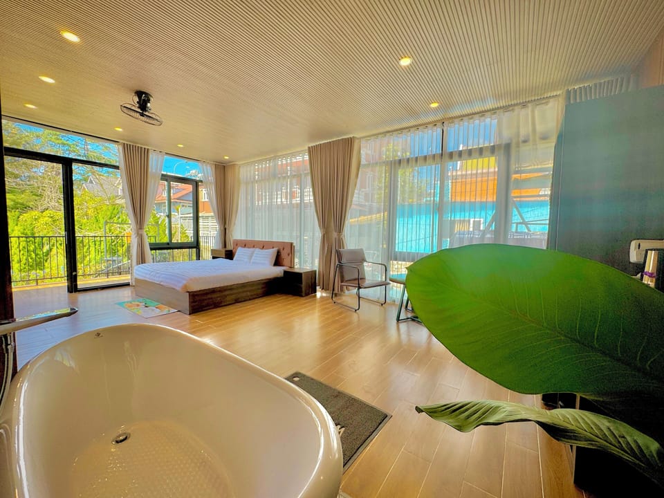 Deluxe Double Room, Garden View | Bathroom | Bathtub, deep soaking tub, free toiletries, hair dryer