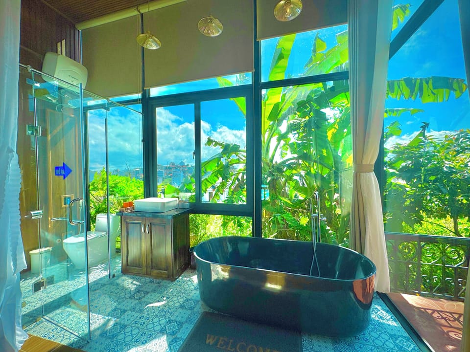 Grand Double Room, Garden View | Bathroom | Bathtub, deep soaking tub, free toiletries, hair dryer