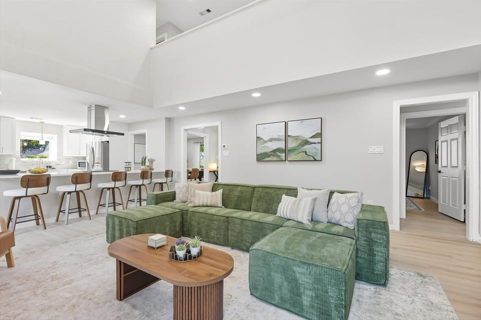 Comfortable Living Room with Plenty of Space and 75" TV