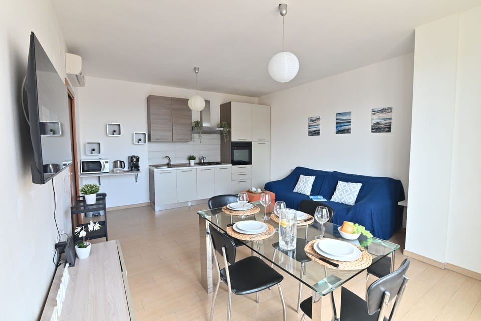 Basic Apartment | Living area | Flat-screen TV