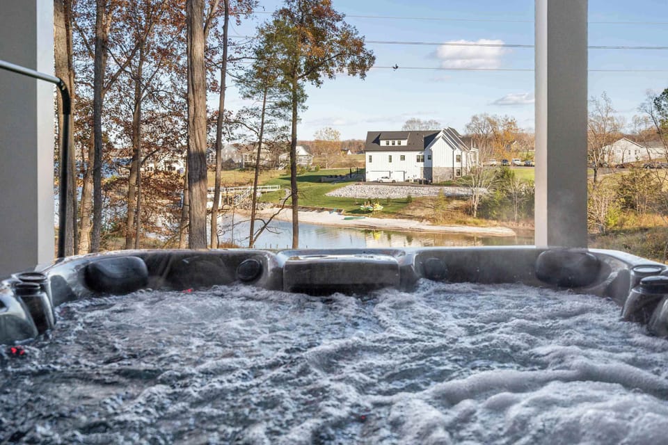 Hot Tub and Lake - Another angle of the hot tub with a clear view of the water and surrounding homes.