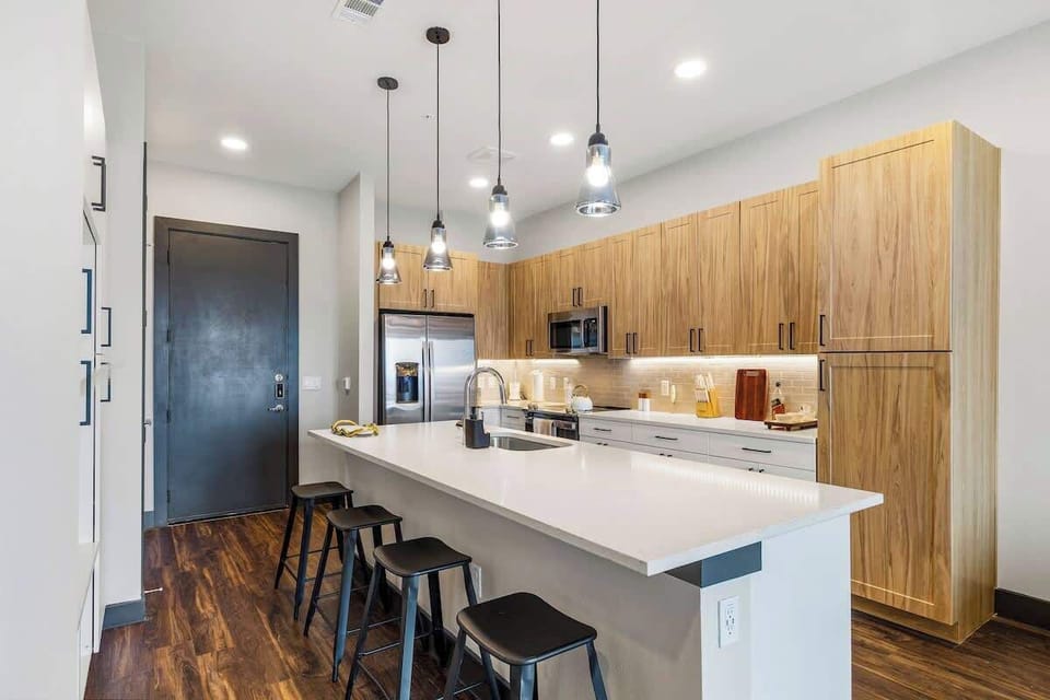 Open-concept kitchen with bar seating and ample counter space