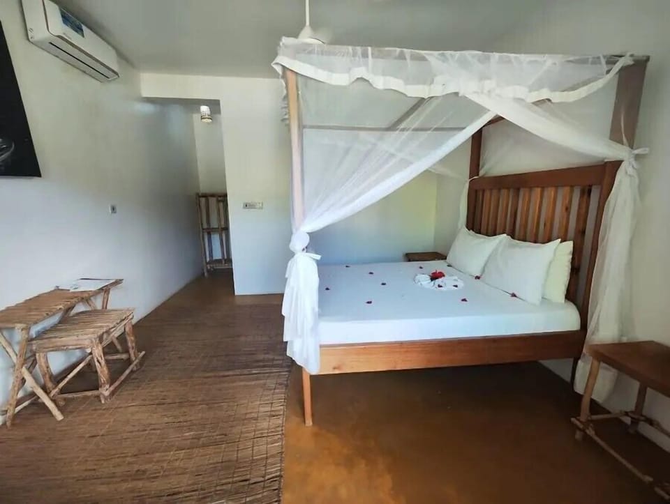 Deluxe Double or Twin Room, Pool View | Desk, laptop workspace, free WiFi