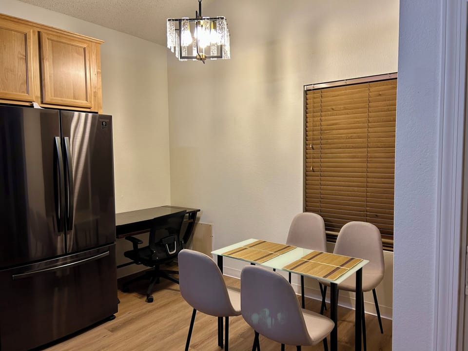 breakfast nook and desk at end of kitchen