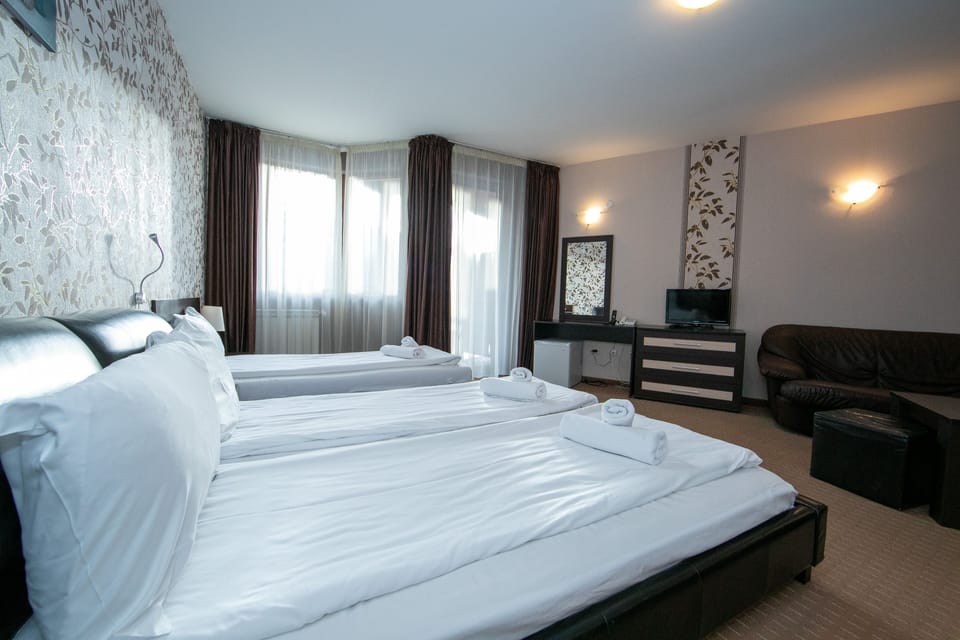 Standard Triple Room | In-room safe, iron/ironing board, free WiFi, bed sheets
