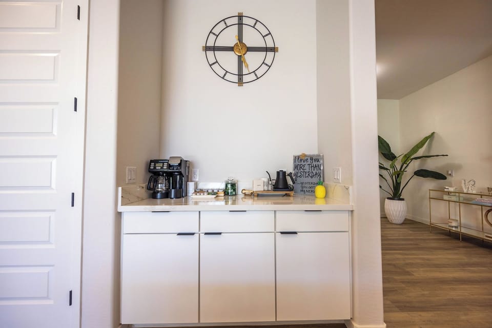 Beverage station stocked with coffee and tea.