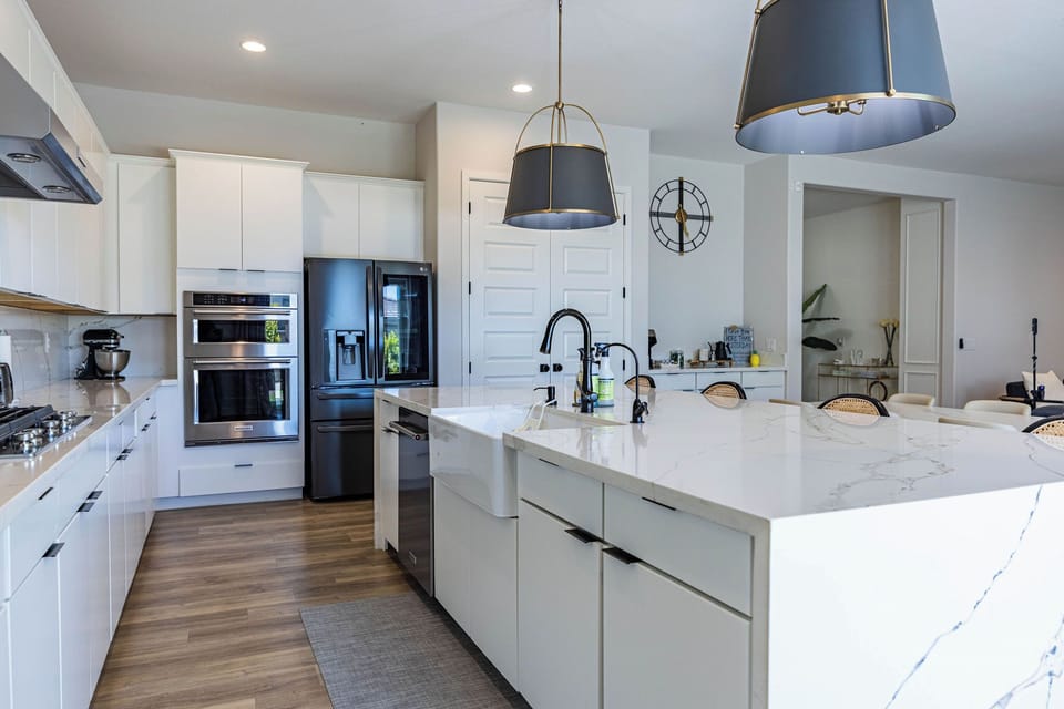 Kitchen with gas range and modern finishes.