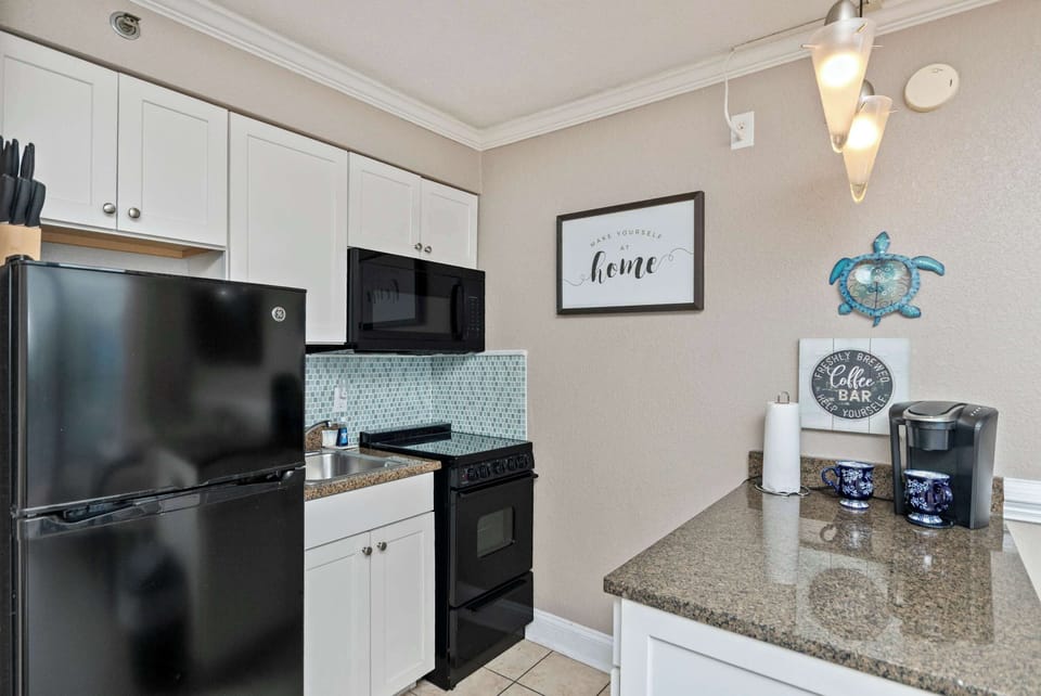 Cook, dine, and unwind in a clean, open-concept kitchen made for guests.