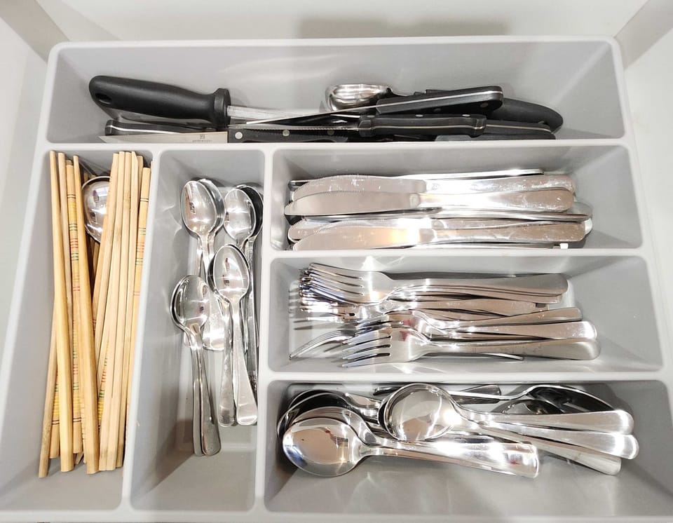Full kitchen, oven, cook top, utensils, plates etc