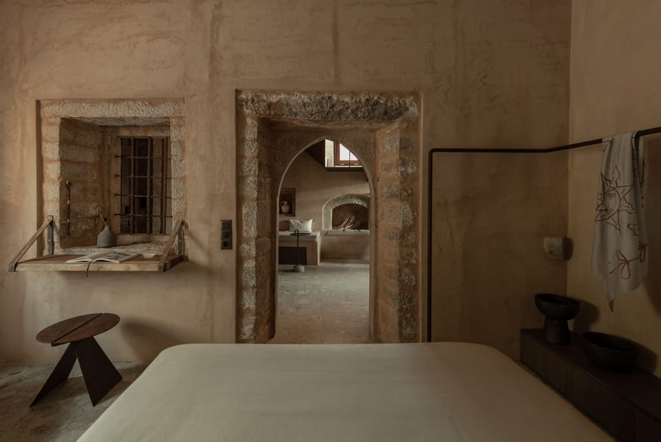 A serene bedroom sanctuary blending warm textures.