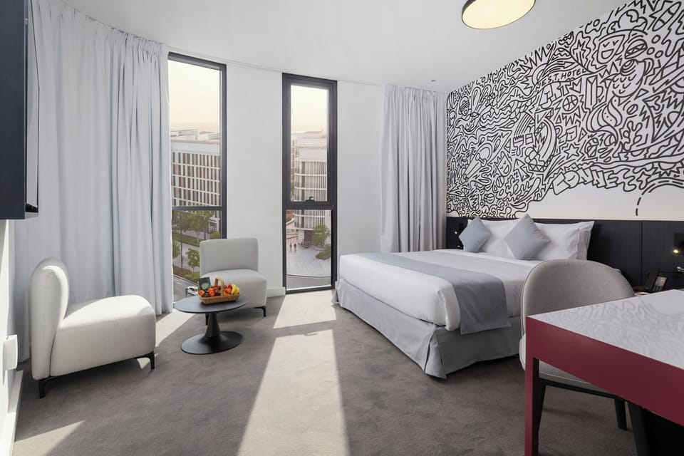 Signature Room | In-room safe, desk, laptop workspace, iron/ironing board