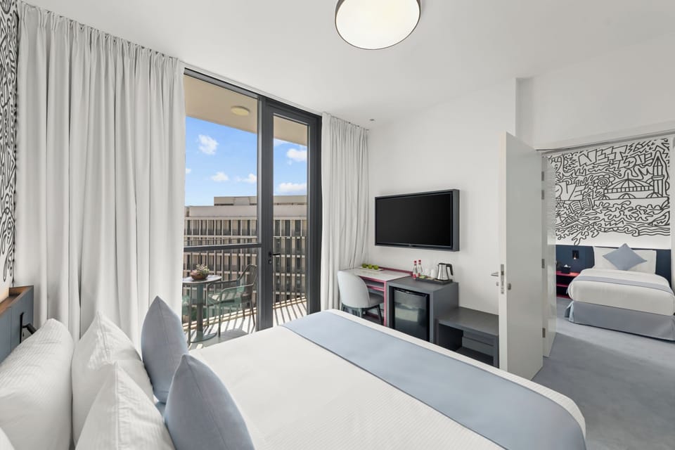 Select Family Room with Balcony | In-room safe, desk, laptop workspace, iron/ironing board
