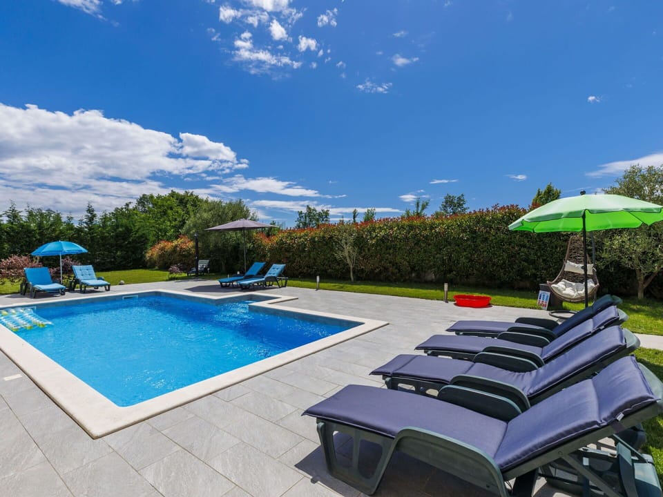 Blue, Swimming Pool, Outdoor Furniture, Resort, Garden, Leisure, Landscaping, Eco Hotel, Sunlounger, Chair