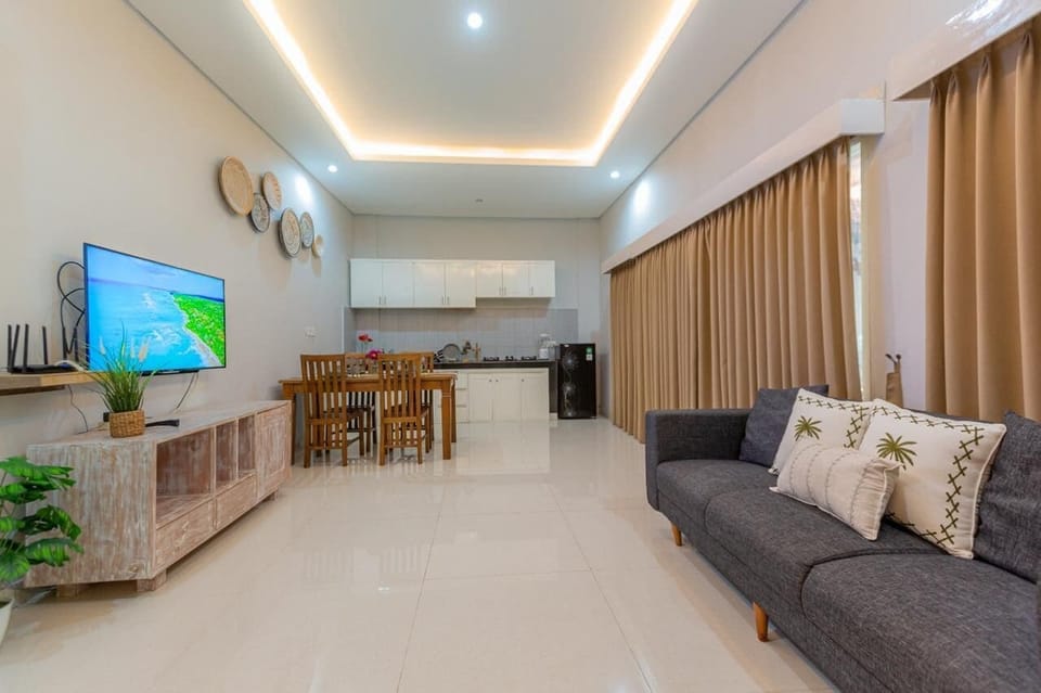 Family Suite | Living area | TV