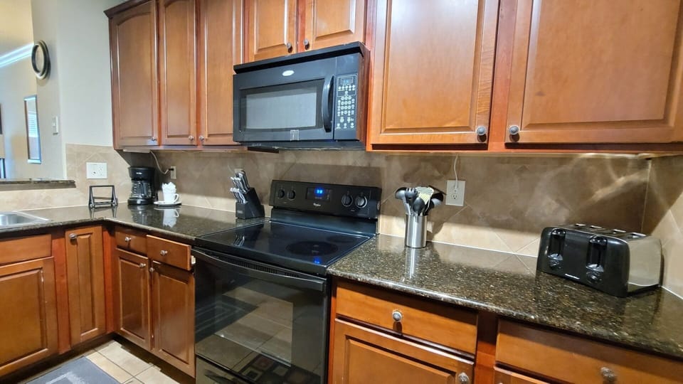 Condo, 4 Bedrooms | Private kitchen | Coffee/tea maker, fridge, oven, toaster