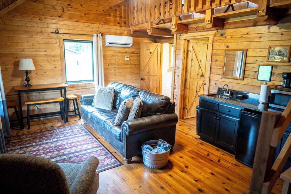 Deluxe Quadruple Room, Patio, Mountain View | Living area