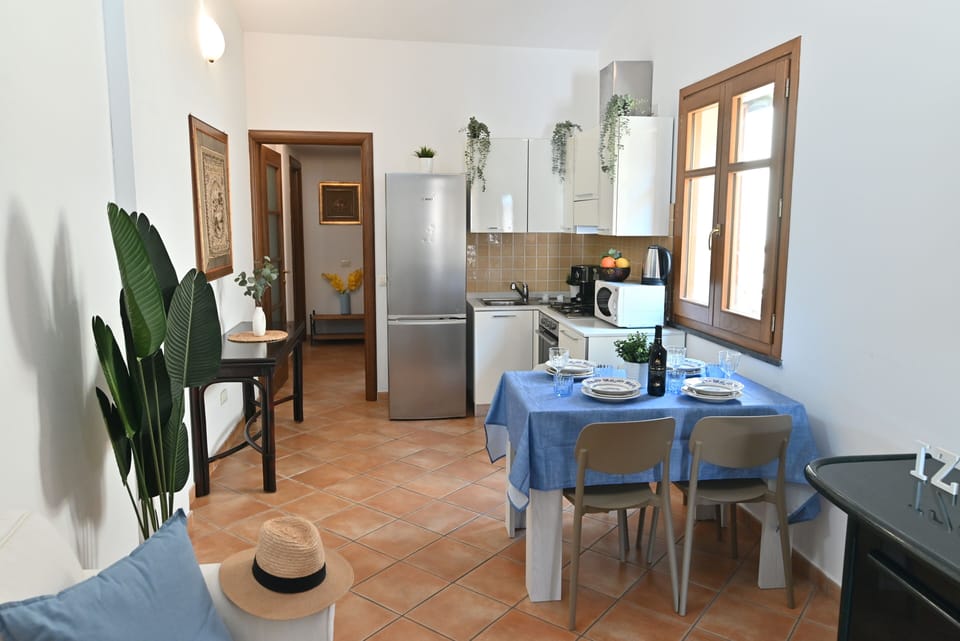 Apartment, City View | Private kitchen | Electric kettle, highchair