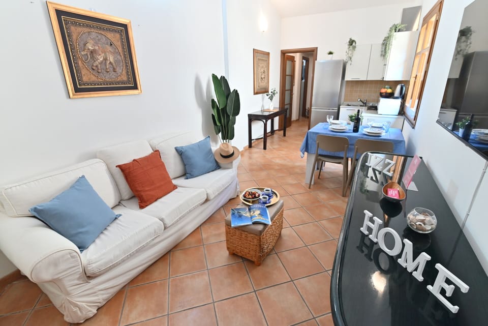 Apartment, City View | Living area | Flat-screen TV