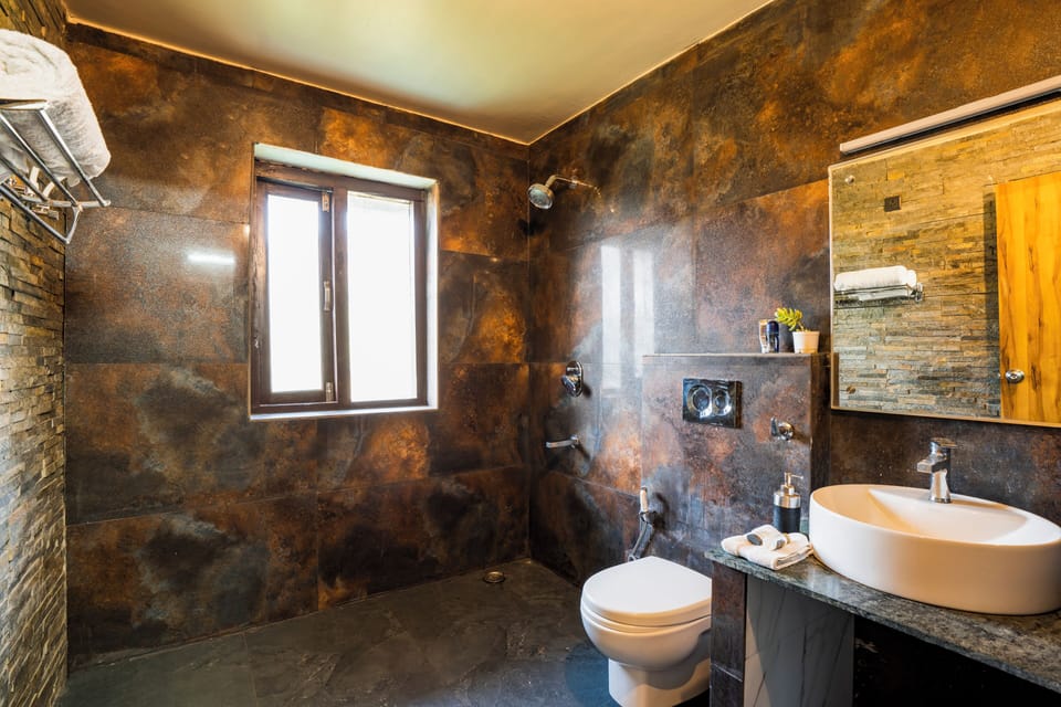 Luxury Quadruple Room, Mountain View | Bathroom | Shower, free toiletries, towels, soap