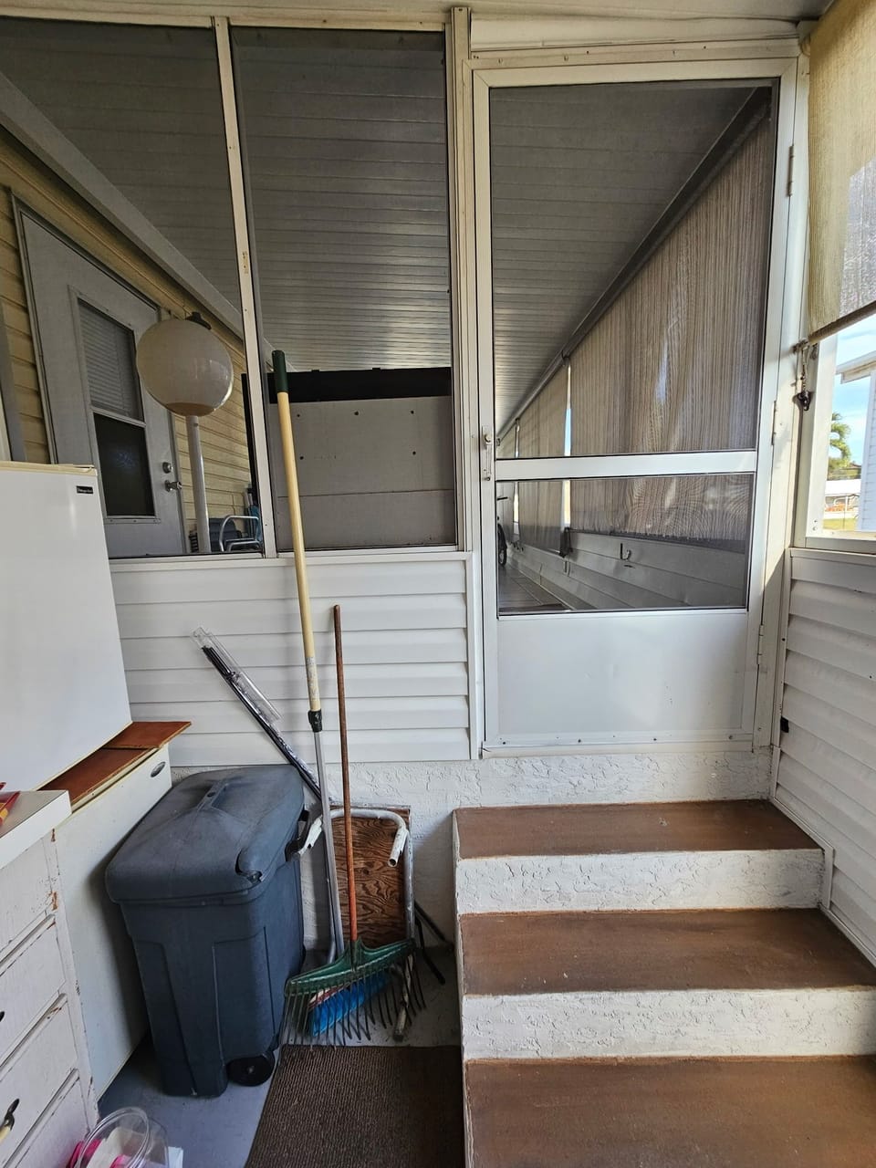 Utility room with small beer fridge and small freezer