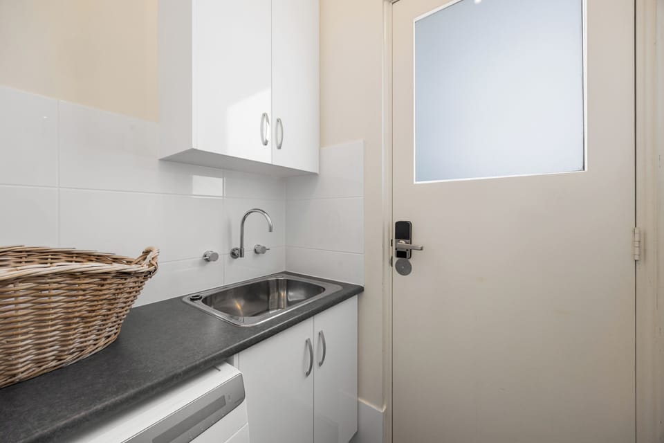 A combination washer and dryer machine in the laundry room comes in handy, especially for longer stays.