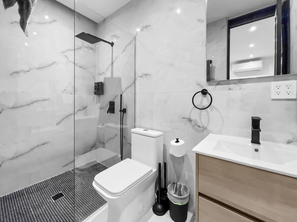 A sleek, modern bathroom designed for comfort and convenience.