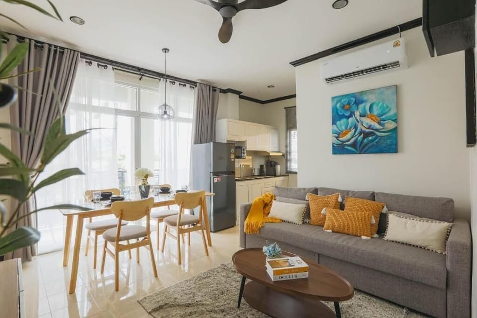Apartment, 4 Bedrooms, Balcony, City View | Living area | Flat-screen TV