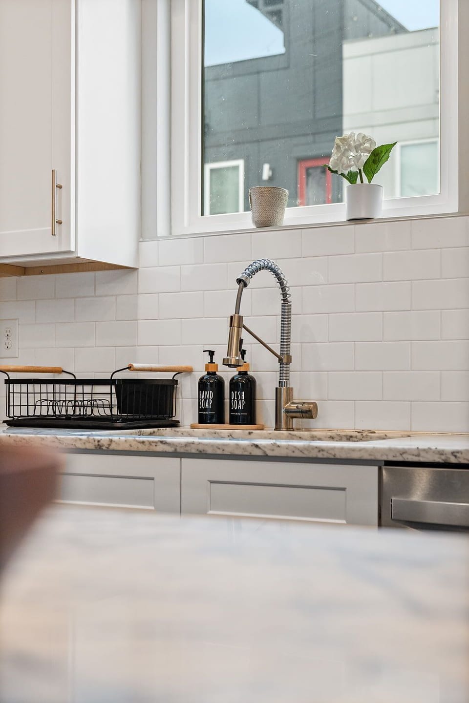 Kitchen: A modern kitchen with sleek finishes and updated appliances.