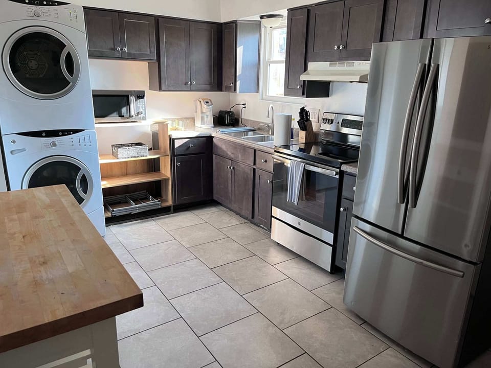 Kitchen: With the ample space in the kitchen, you won't have to worry about bumping into each other while preparing meals.