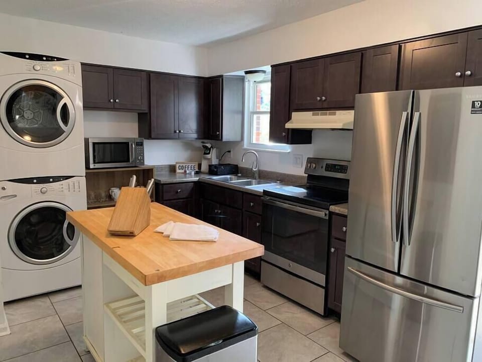 Kitchen: The kitchen has been recently remodeled to offer more space, with new stainless appliances, an island table, an eat-up bistro table, and a new washer/dryer, all designed to make it even more convenient and functional.