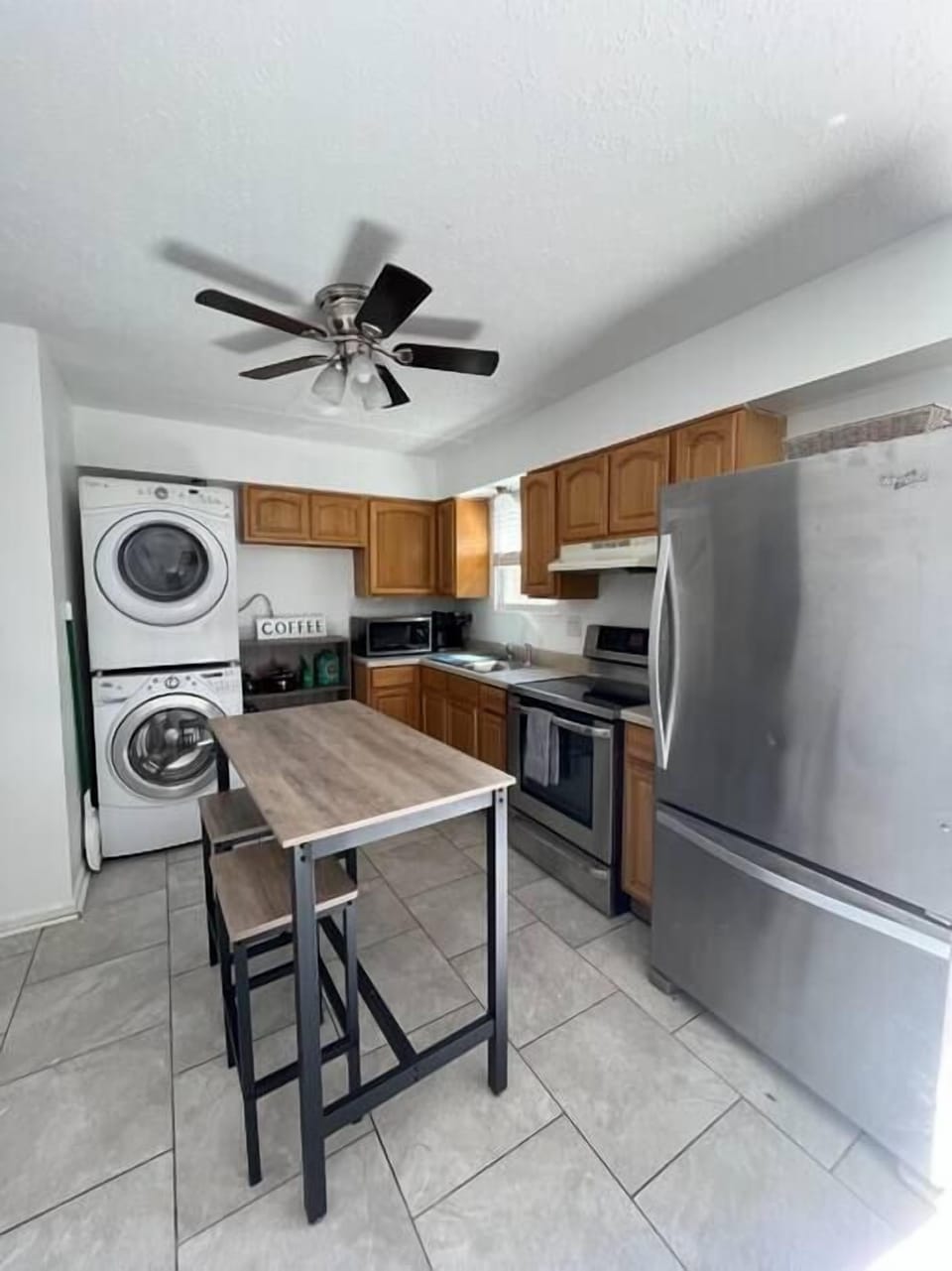 Kitchen: Enjoy the perks of our kitchen and laundry room combo, designed to give you the best of both worlds in a convenient way.
