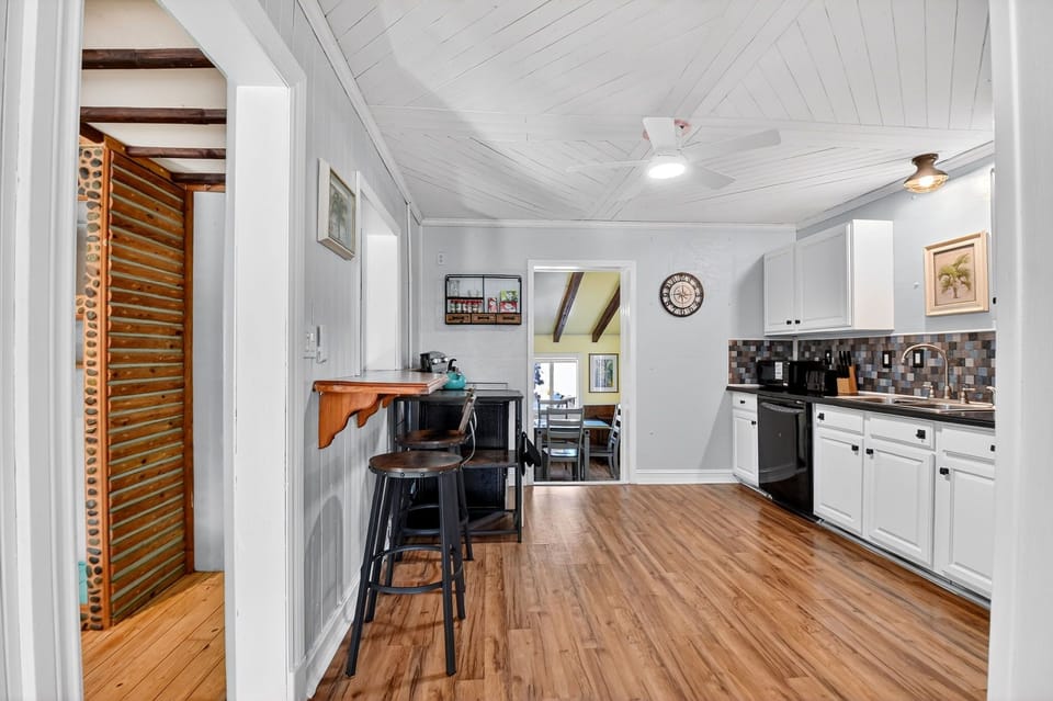 Fully-stocked kitchen with new fridge, electric stove, dishwasher, Kurig coffee.