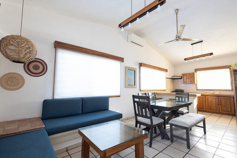 Family Villa, Garden View | Living area | 32-inch flat-screen TV with cable channels