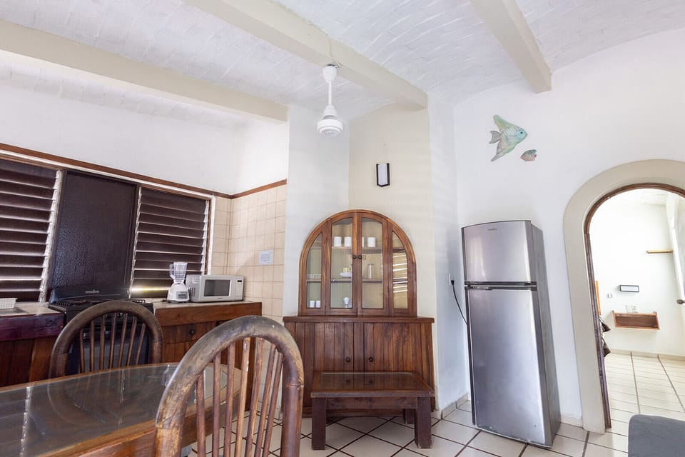 Standard Room, 1 King Bed | Private kitchen | Full-size fridge, microwave, cookware/dishes/utensils