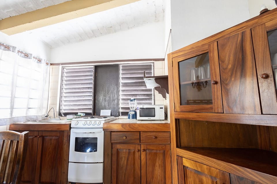 Basic Room, 2 Twin Beds, Garden View | Private kitchen | Full-size fridge, microwave, cookware/dishes/utensils