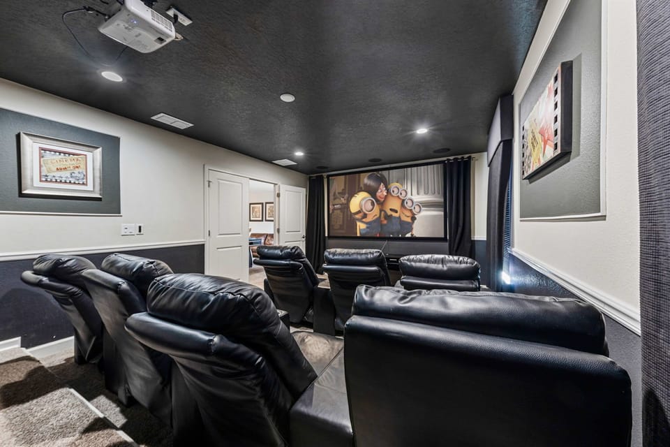 Your own private theater with plush seating and a massive screen, ideal for popcorn-filled movie nights or binge-watching favorites.