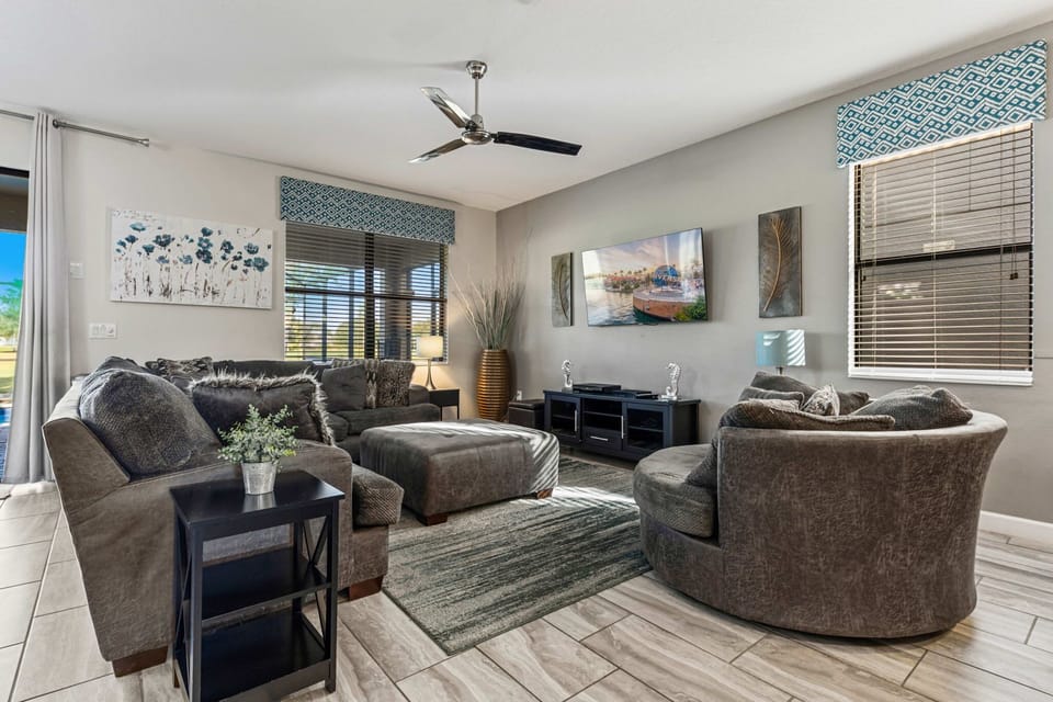 A bright, open living space designed for family gatherings, movie nights, and relaxing after long days at the water park.