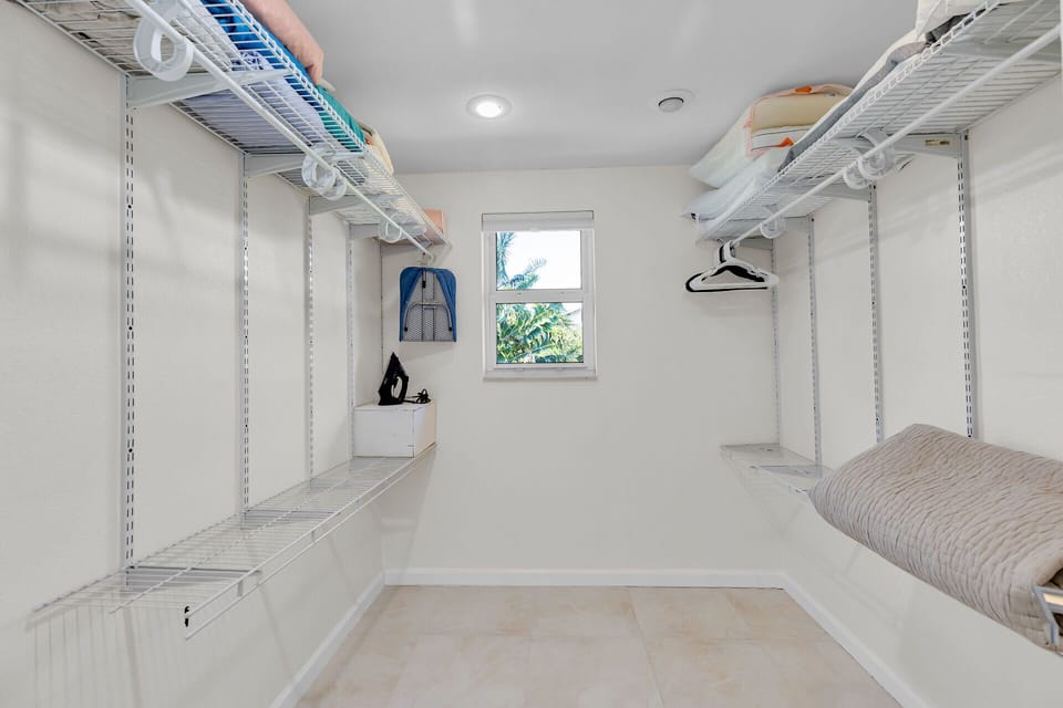A spacious master closet located separately from the bedrooms for added flexibility and storage