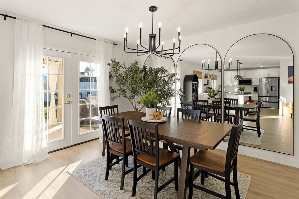 Dining area with elegant lighting, perfect for family meals.
