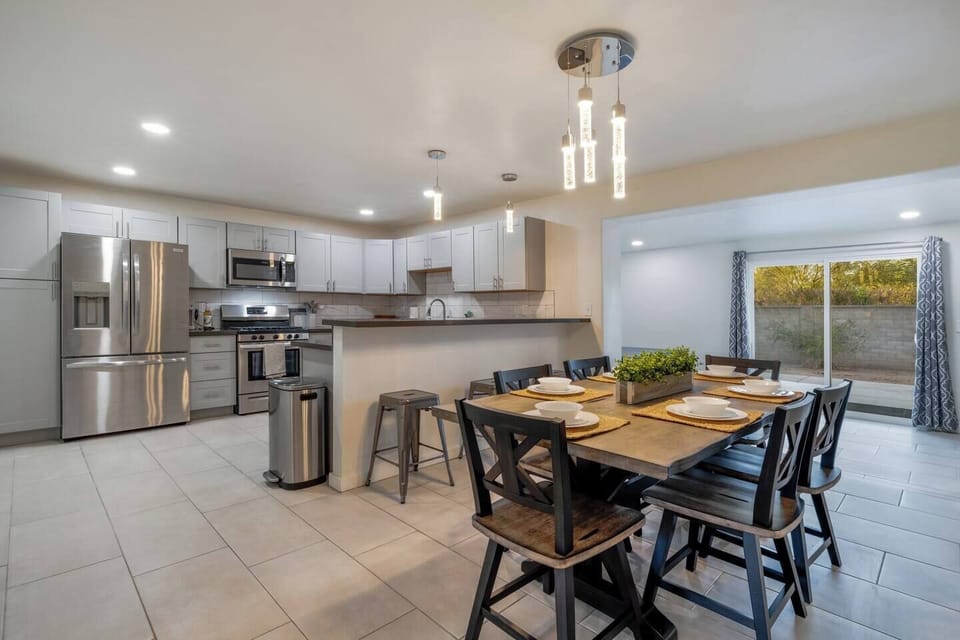 Dining area, just steps from the kitchen, with a beautiful table that comfortably seats six