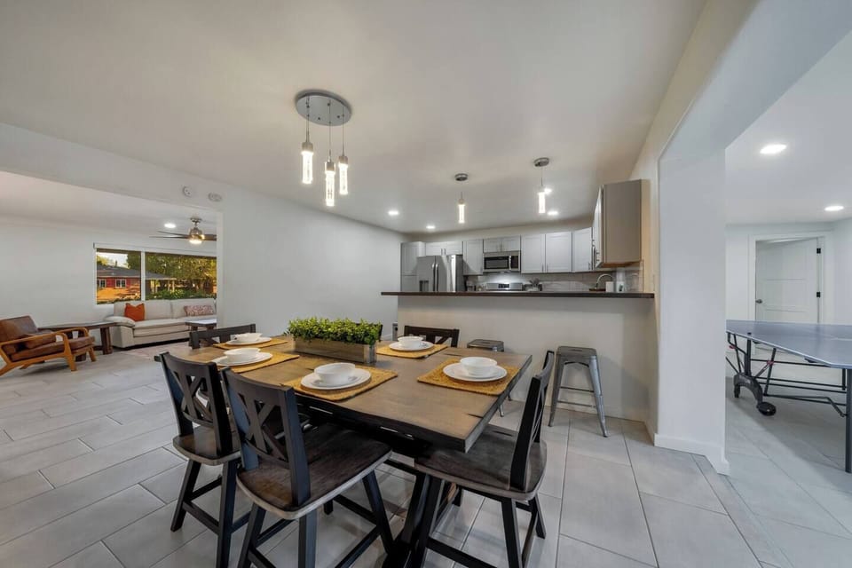 Dining area, just steps from the kitchen, with a beautiful table that comfortably seats six